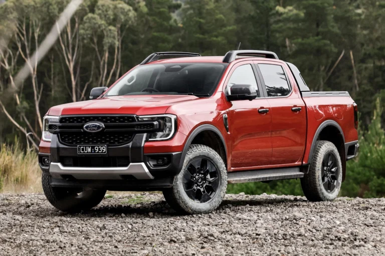 Ford posts $77.6 billion record revenue amid tariff losses